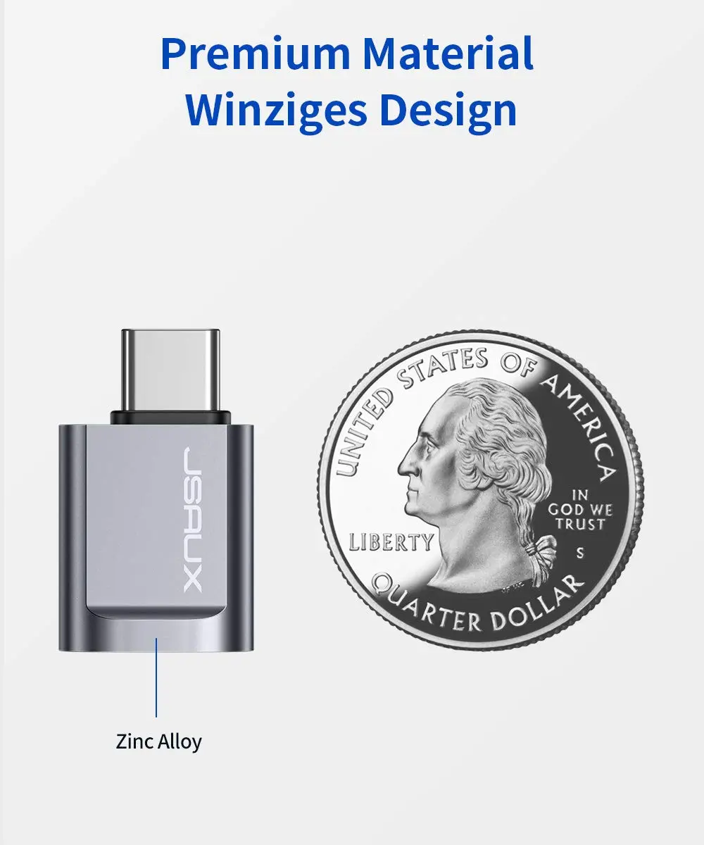Two grey JSAUX USB-C to USB 3.0 OTG adapters plugged side-by-side into a MacBook Pro, demonstrating the offset design that allows simultaneous use with fast 5Gbps data transfer.
