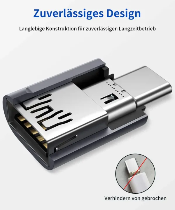 Two grey JSAUX USB-C to USB 3.0 OTG adapters plugged side-by-side into a MacBook Pro, demonstrating the offset design that allows simultaneous use with fast 5Gbps data transfer.