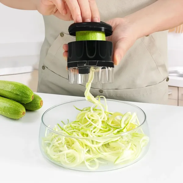 This compact 3-in-1 vegetable spiralizer with stainless steel blades easily creates zucchini noodles, carrot spirals, and cucumber ribbons for healthy low-carb meals, and features a non-slip grip for safe and efficient use.