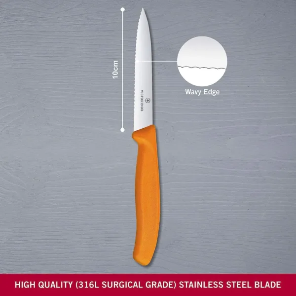 A close-up shows a Victorinox Swiss Classic 3.9-inch paring knife with a serrated blade and orange handle, perfect for precision cutting of fruits and vegetables in the kitchen.