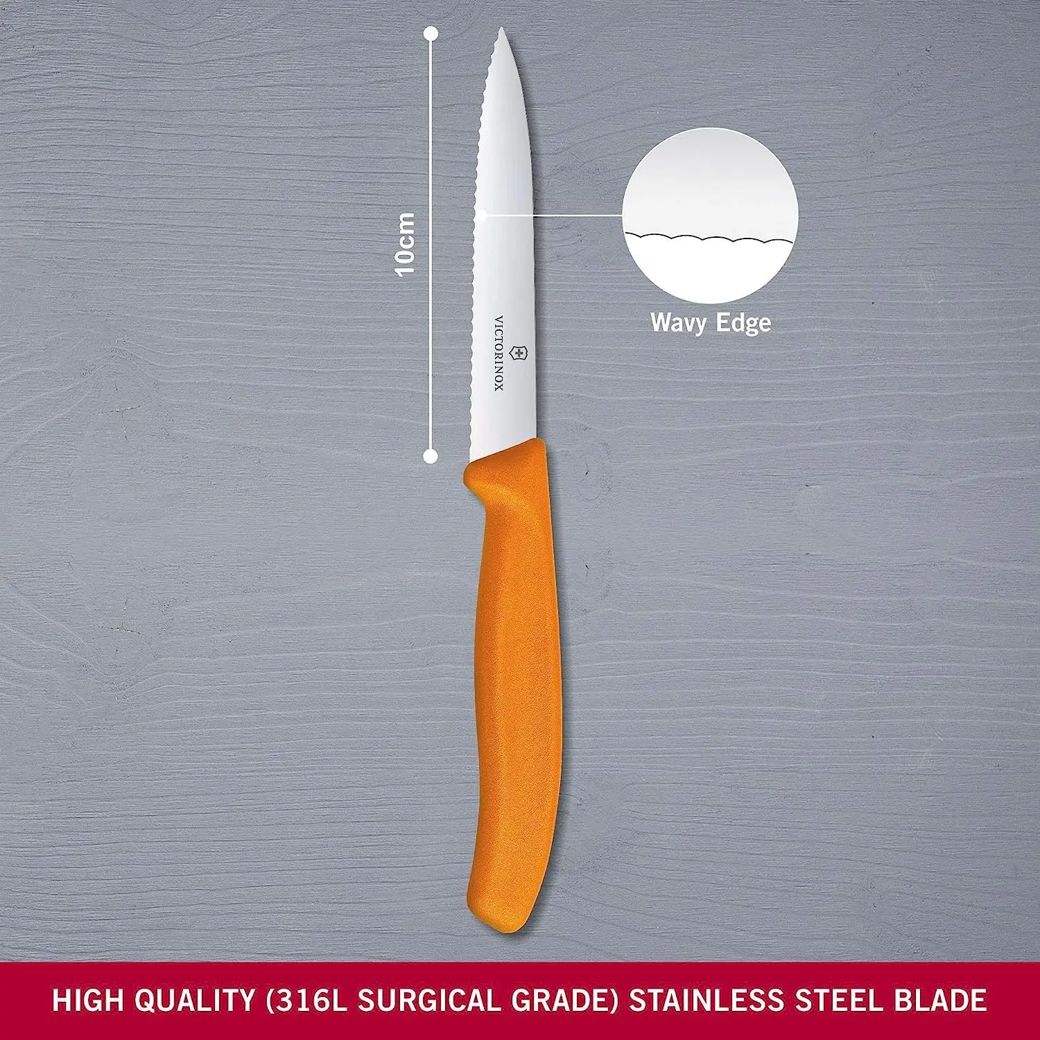 A close-up shows a Victorinox Swiss Classic 3.9-inch paring knife with a serrated blade and orange handle, perfect for precision cutting of fruits and vegetables in the kitchen.