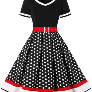 A woman poses in a Nihsatin vintage 1950s-style rockabilly swing dress, featuring a square neck, classic short sleeves, a fit and flare silhouette, and a removable belt, perfect for parties and special occasions.