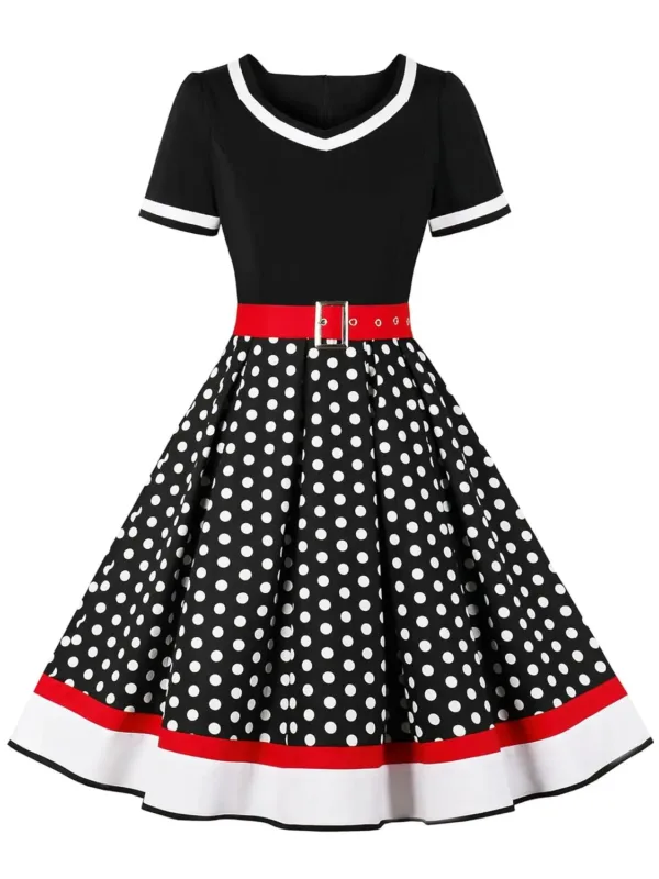 A woman poses in a Nihsatin vintage 1950s-style rockabilly swing dress, featuring a square neck, classic short sleeves, a fit and flare silhouette, and a removable belt, perfect for parties and special occasions.