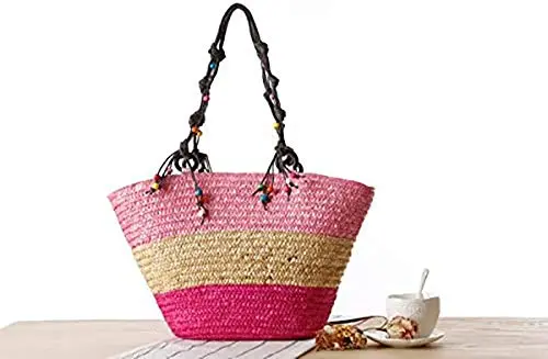 This is a handmade straw woven beach bag with embroidery and beading, perfect for women's fashion as a summer handbag or knitted tote.