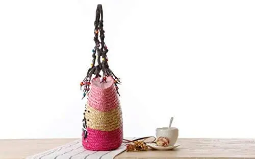 This is a handmade straw woven beach bag with embroidery and beading, perfect for women's fashion as a summer handbag or knitted tote.