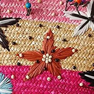 This is a handmade straw woven beach bag with embroidery and beading, perfect for women's fashion as a summer handbag or knitted tote.