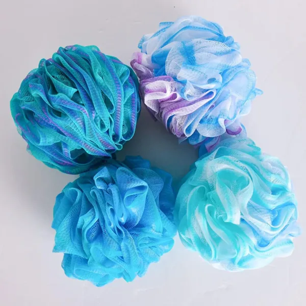 This set of four colorful bath shower sponges are designed with strong knotting for durability and effectively exfoliate the skin for a smoother, cleaner feel.