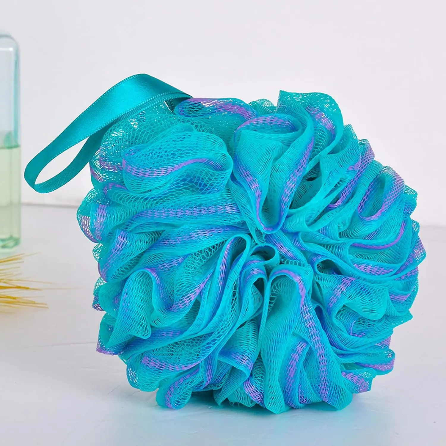 This set of four colorful bath shower sponges are designed with strong knotting for durability and effectively exfoliate the skin for a smoother, cleaner feel.