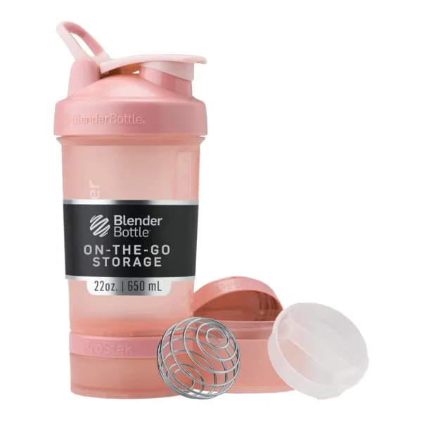 This rose pink BlenderBottle ProStak shaker bottle features a pill organizer and storage for protein powder, making it perfect for gym-goers and those on-the-go.