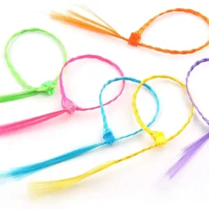 These colorful clip-in hair extensions for girls are made of high-quality nylon and feature secure clips for easy attachment, perfect for adding a fun, vibrant touch to any hairstyle at parties, birthdays, and everyday wear.