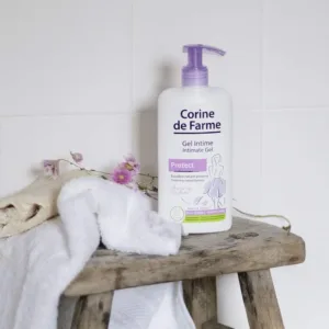 This is a bottle of Corine de Farme Intimate Care Gel with Lily Flower, a gentle cleanser for external use that protects and soothes, but should not be used on damaged or irritated skin, and should be rinsed carefully.