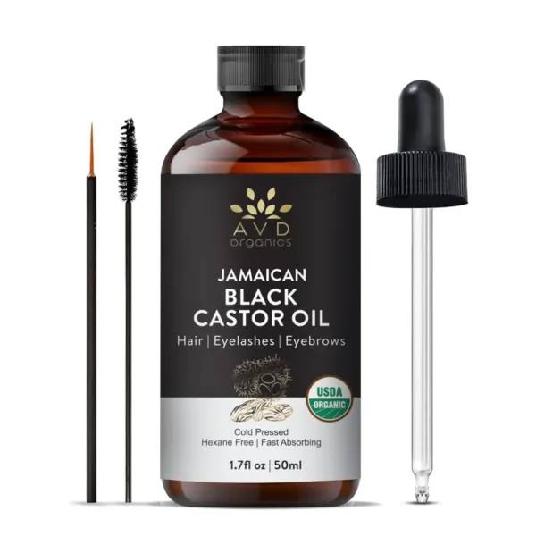 A bottle of AVD Organics Jamaican Black Castor Oil with dropper and lash brush, for moisturizing hair and skin and promoting eyelash and eyebrow growth.