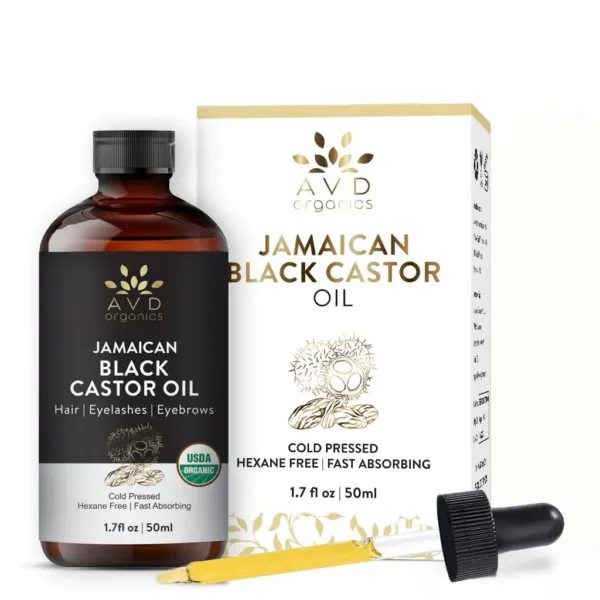 A bottle of AVD Organics Jamaican Black Castor Oil with dropper and lash brush, for moisturizing hair and skin and promoting eyelash and eyebrow growth.