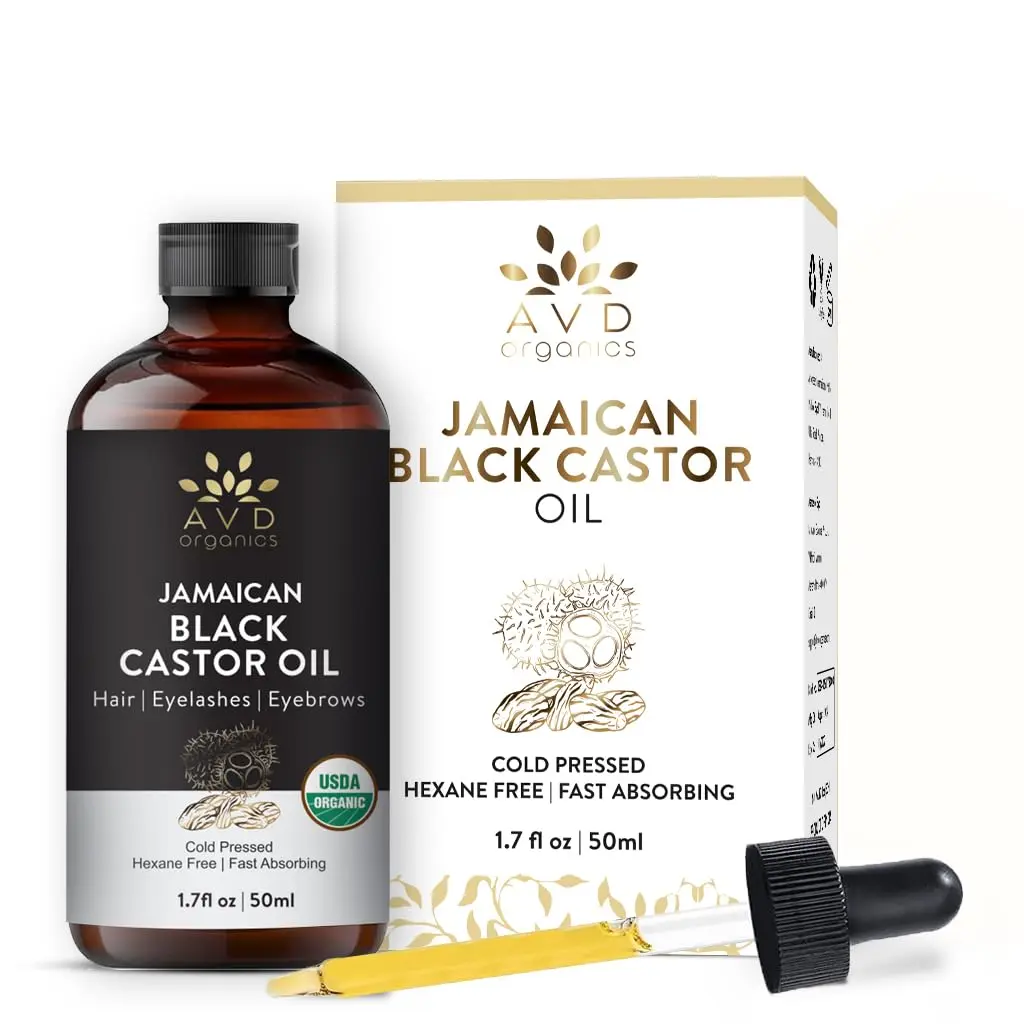 A bottle of AVD Organics Jamaican Black Castor Oil with dropper and lash brush, for moisturizing hair and skin and promoting eyelash and eyebrow growth.