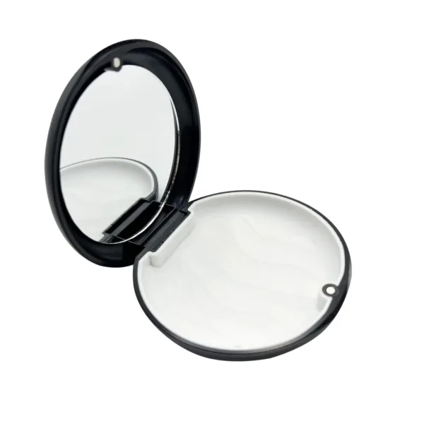 This black orthodontic retainer case with a built-in mirror offers a convenient and hygienic solution for storing and carrying aligners, dentures, mouth guards, and other small orthodontic appliances.